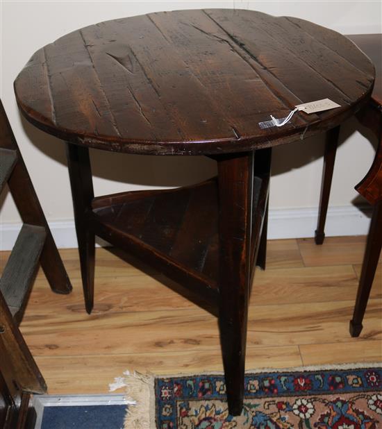 A reproduction oak cricket table, W.72cm